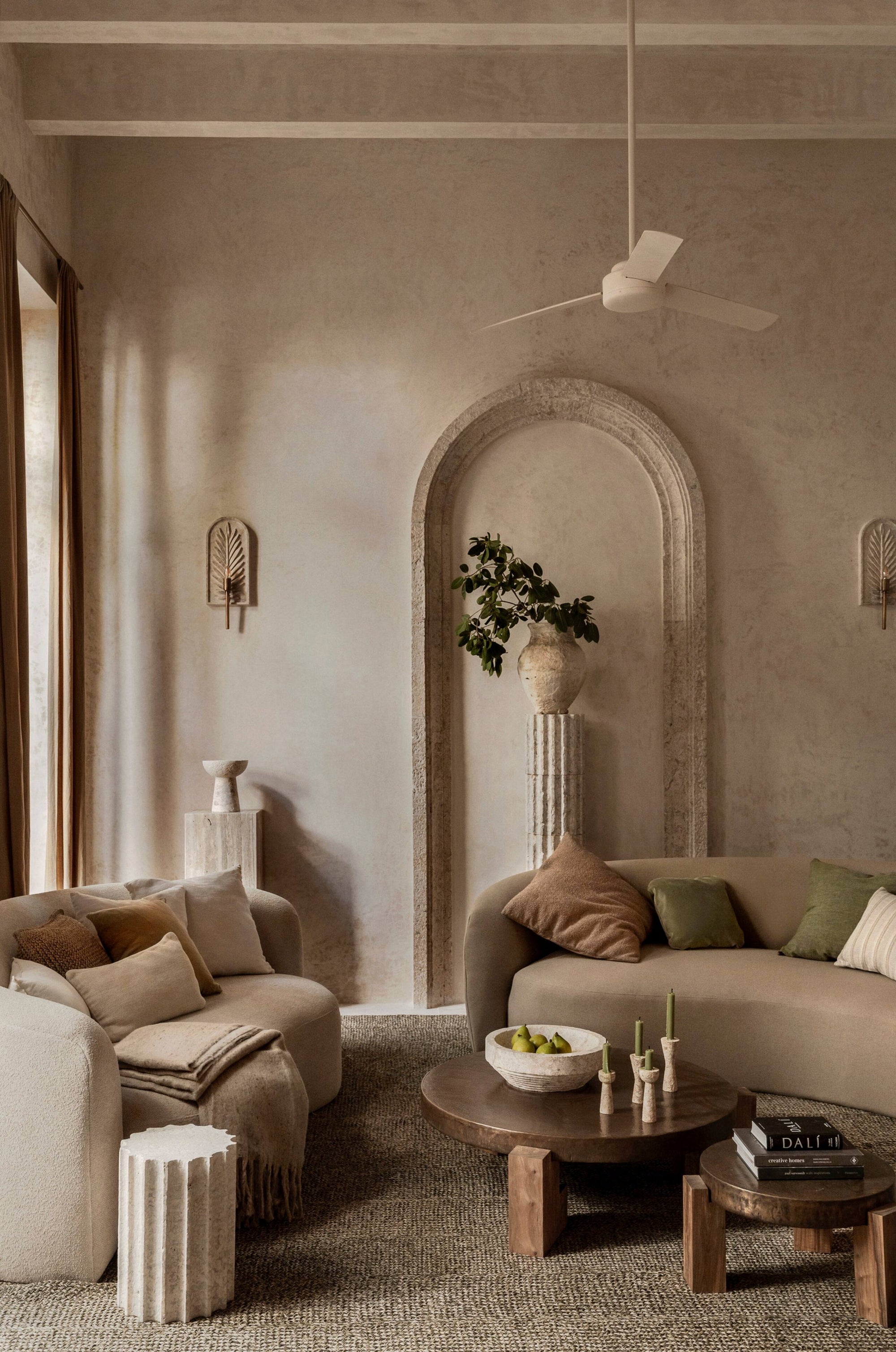 Handmade sculptural floor lamp with stone-effect finish in an interior