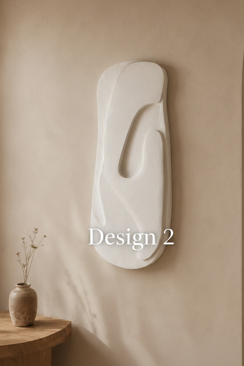 An abstract white wall art sculpture with organic flowing lines, mounted on a warm beige plaster wall in a minimalist interior setting.