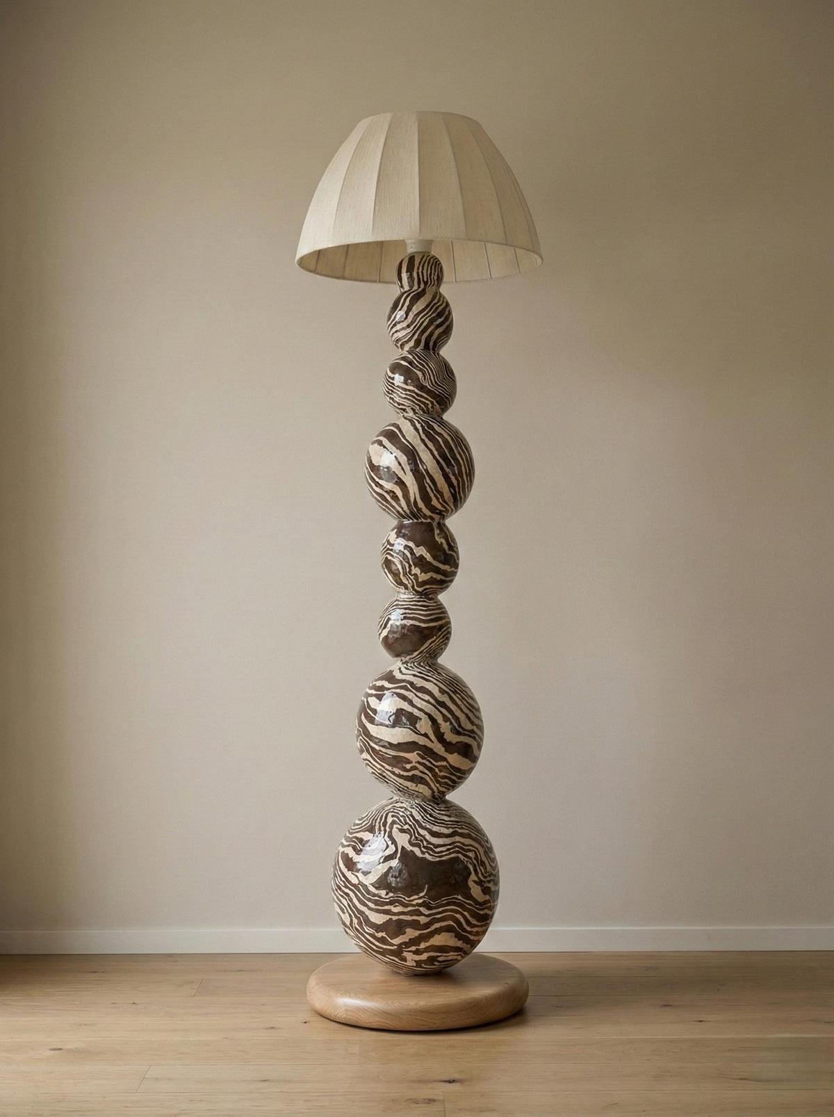 Zebra Sphere Mushroom Lamp — a handcrafted stacked-sphere floor lamp with a zebra-patterned plaster body and linen shade
