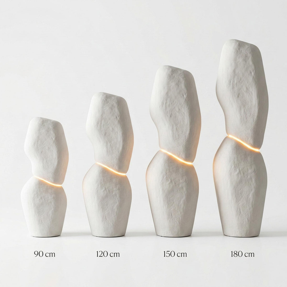Monolith Totem Light — a handmade sculptural floor lamp with a plaster-finished monolithic body and warm LED strip, made in 90–180 cm