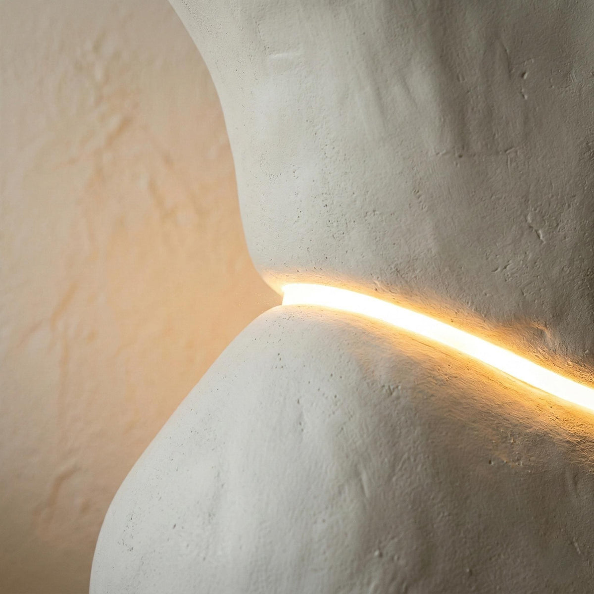 Monolith Totem Light — a handmade sculptural floor lamp with a plaster-finished monolithic body and warm LED strip, made in 90–180 cm