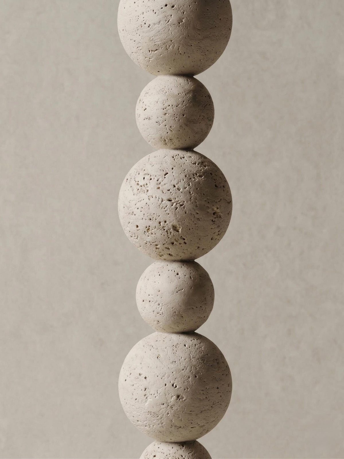 Minimalist Stone-Look Totem — a handcrafted sphere totem with a travertine-effect finish over a lightweight composite core, 160–180 cm