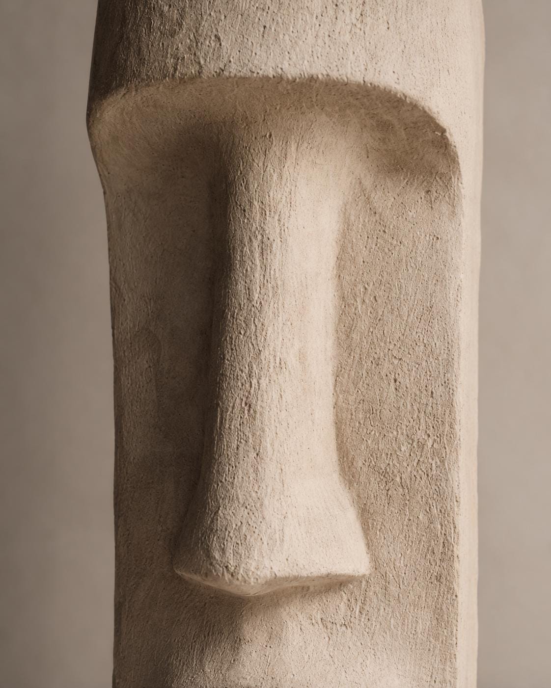 Moai Face Totem Sculpture — a handmade faux-limestone floor totem carved with a moai-inspired face, made in 90–180 cm