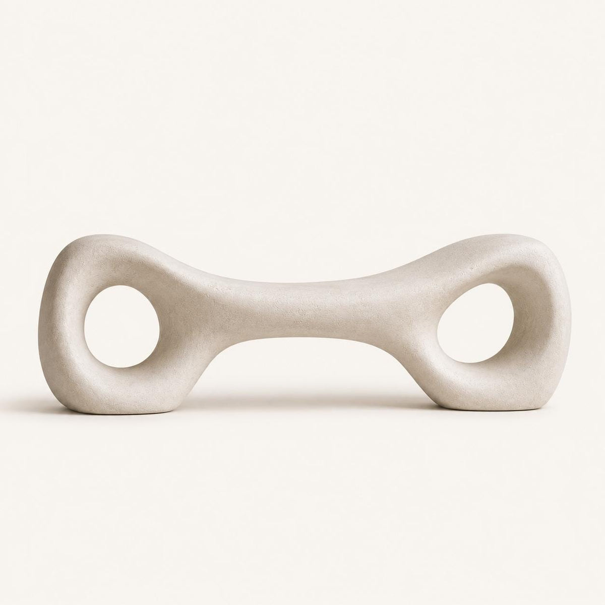 Side view of the Organic Sculptural Minimalist Bench against a plain background