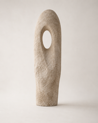 The open hollow form of the Monolith Totem floor sculpture